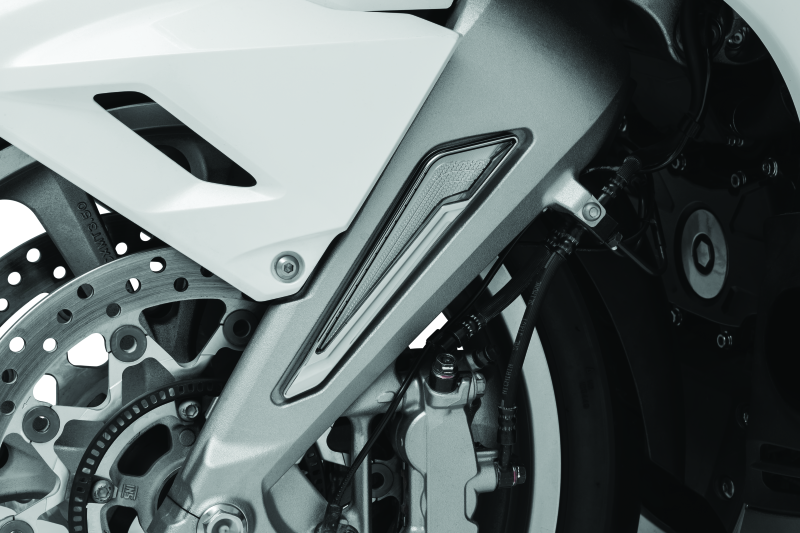Kuryakyn Omni LED Fork Inserts in chrome for Honda Gold Wing 2018-2020 motorcycle, visible installed on front fork.