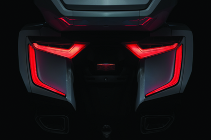 Kuryakyn Omni LED rear bag accents on a Honda GL1800 Gold Wing motorcycle, showcasing sleek LED lighting for luggage area.