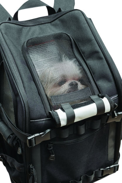 Kuryakyn Pet Palace Ruff-Pack durable backpack pet carrier with mesh ventilation for small pets up to 15 lbs, designed for outdoor adventures.