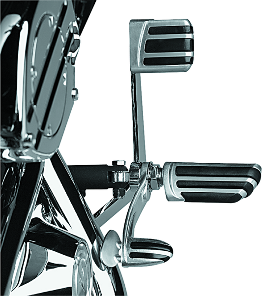 Chrome Kuryakyn Pilot Pegs with Stirrup Male Mount Adapter for motorcycle comfort and style.