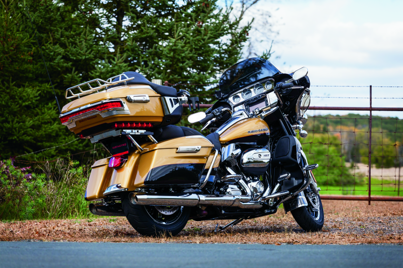 Kuryakyn Relocator for Tour-Pak 14-Up Touring Models in black, designed for adjustable rear luggage positioning
