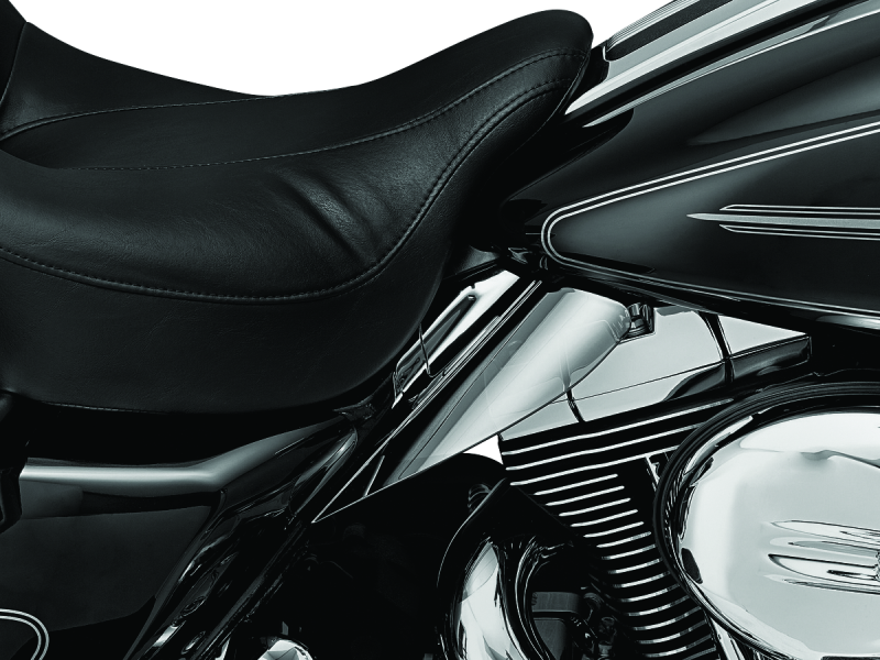 Kuryakyn Saddle Shields Heat Deflectors for Harley Davidson Touring Models 2009-2010, mounted on motorcycle seats.
