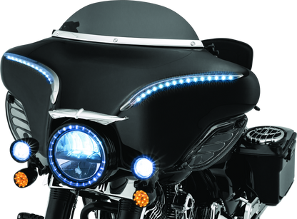 Kuryakyn Smooth Windshield Trim for Harley Davidson Touring models 96-13, chrome finish, installed on motorcycle windshield.