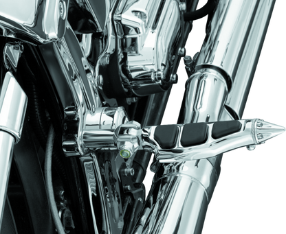 Kuryakyn Stiletto Pegs with Male Mount in chrome for Harley Davidson and metric motorcycles, shown on motorcycle footrest.