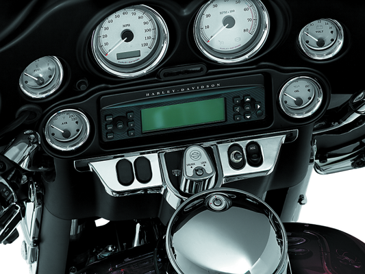Kuryakyn Chrome Switch Panel Accent for Harley Davidson Touring Models, part 3783, showing the shiny chrome finish and mounting details.