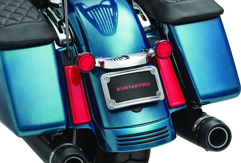 Kuryakyn Tracer Filler Panel Lights with red lens, custom LED accent for motorcycle saddlebags, enhances visibility and style.