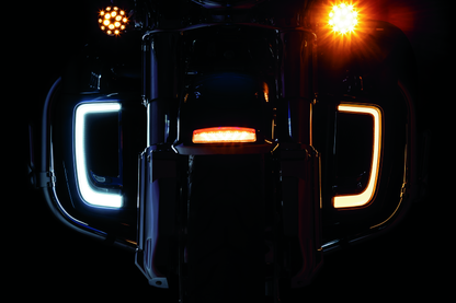 Chrome Kuryakyn Tracer Lower Fairing Grill for Harley Davidson Touring Models, close-up of the shiny, decorative motorcycle fairing accessory.