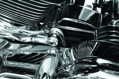 Chrome transmission shift arm cover by Kuryakyn for Harley Davidson Touring models, showing detailed chrome finish on the shift arm.