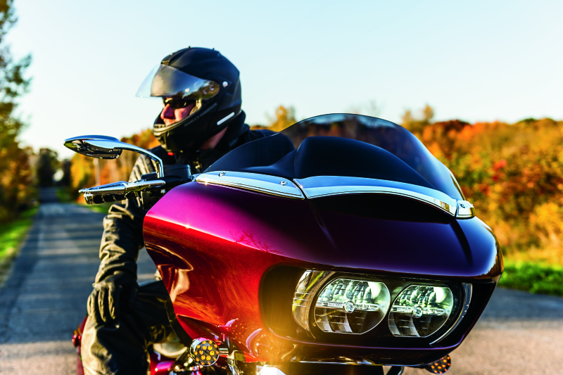 Kuryakyn chrome windshield side trims for Harley-Davidson Road Glide 2015-2021, shown mounted on the motorcycle.