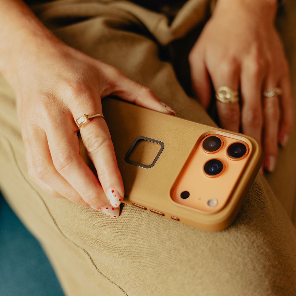 Peak Design Everyday Case for iPhone 17 Pro Max in tan, showing the durable mobile phone case with textured finish and precise cutouts.
