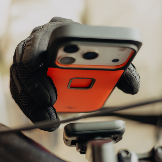 Peak Design Gnar Case for iPhone 17 Pro Max in Ibis color, shown on a mobile phone with lifestyle background.