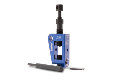 Motion Pro Adv Chain Tool 08-0741, lightweight aluminum chain breaker for touring and trail riding, shown in use.