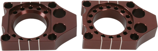 Pro Circuit KAB03 CNC machined aluminum axle blocks for Kawasaki and Suzuki motorcycles, featuring precise machining and durable construction.