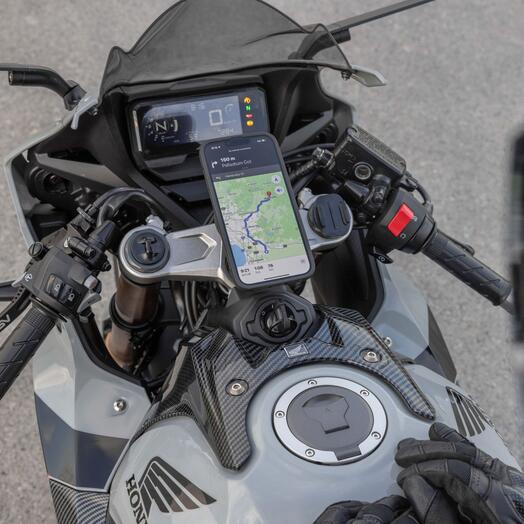 Bill's Exhausts Quad Lock motorcycle fork stem mount Pro accessory attached to handlebar for secure device mounting.