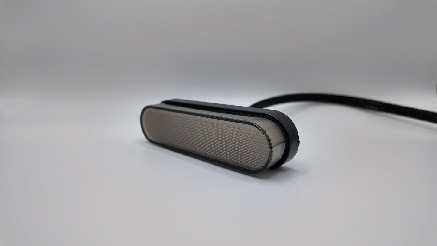 E-Ride 3.0 Cyber Brake Light by Project9 with 2-pin connector, showing the sleek, functional bike brake light in black.