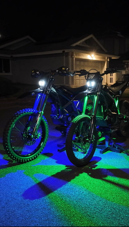 Project9 Hyperglow Surron Ultra Bee under glow kit with purple LED lights, front and rear installed on Surron electric bike.