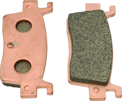QuadBoss rear left sintered brake pad for Kawasaki KRX1000 Teryx 2020, showing the brake pad with detailed surface texture.