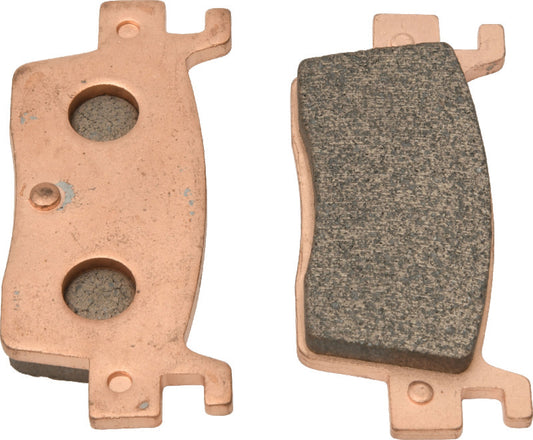 QuadBoss rear left sintered brake pad for Kawasaki KRX1000 Teryx 2020 off-road vehicle, showing the brake pad's surface and mounting edge.
