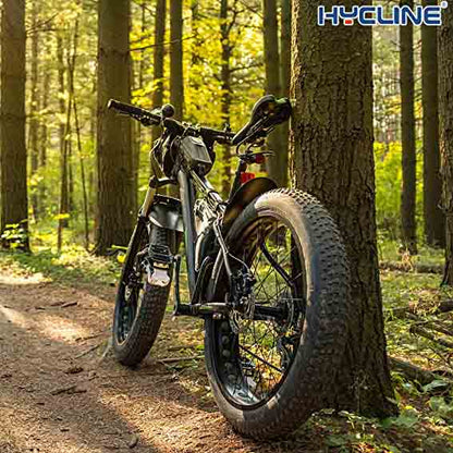 Hycline fat bike tire mounted on E-bike, showcasing durable tread design for off-road riding and stability on rugged terrain.