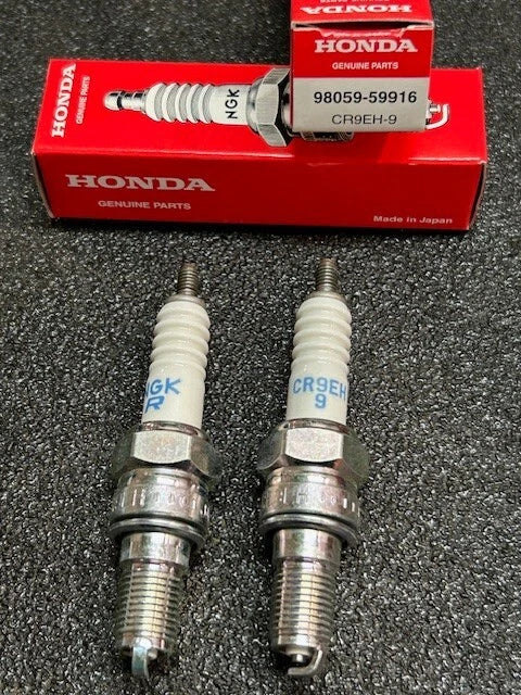 NGK CR9EH-9 spark plug for Honda engines, showing the metal shell and ceramic insulator of this OEM-quality automotive spark plug.