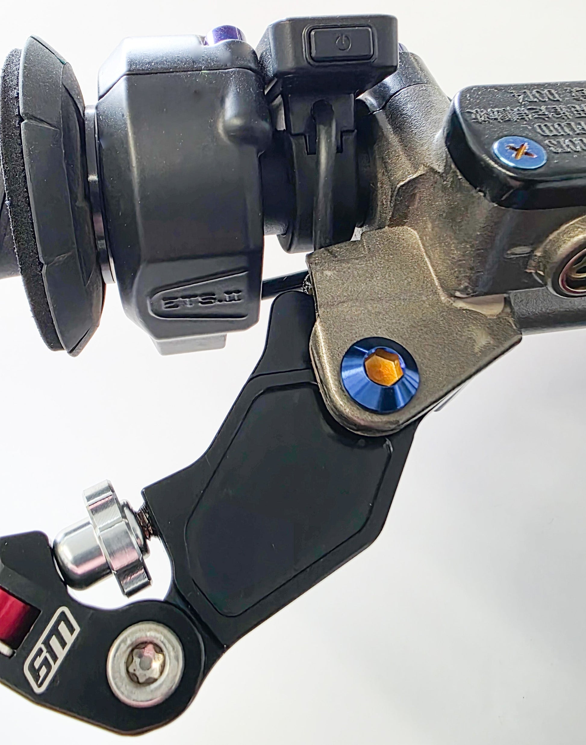 Warp 9 Racing shorty titanium lever pivot bolts in burnt blue for Sur-Ron Ultra Bee, Grade 5 titanium, lightweight and durable.