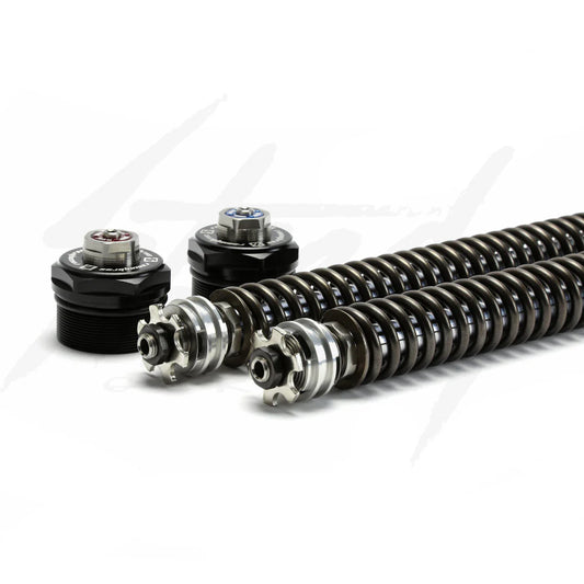 RacingBros Performance Exhaust System RBROS-1006-6.5NMM with polished metal finish on a vehicle, showcasing its sleek design and piping.
