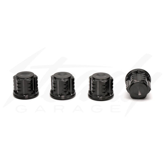 Chimera Engineering closed end titanium M10x1.25 universal nuts for sprockets, wheels, and shocks, shown in a close-up image.