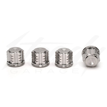 Chimera Engineering M10x1.25 titanium closed-end universal nuts for sprockets, wheels, and shocks, shown on a hardware component.