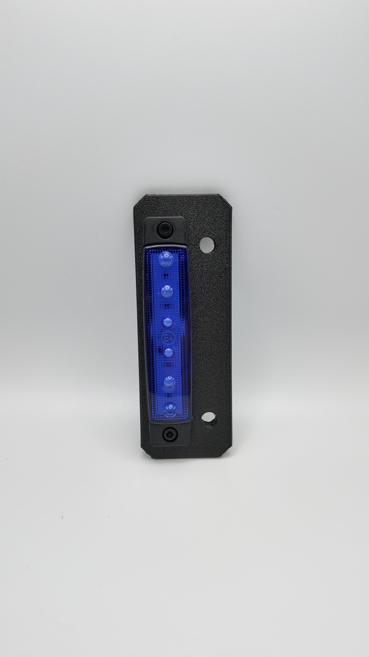 Rear underglow kit for Talaria MX4 and MX5 electric motorcycles, featuring colorful LED lights installed beneath the bike.