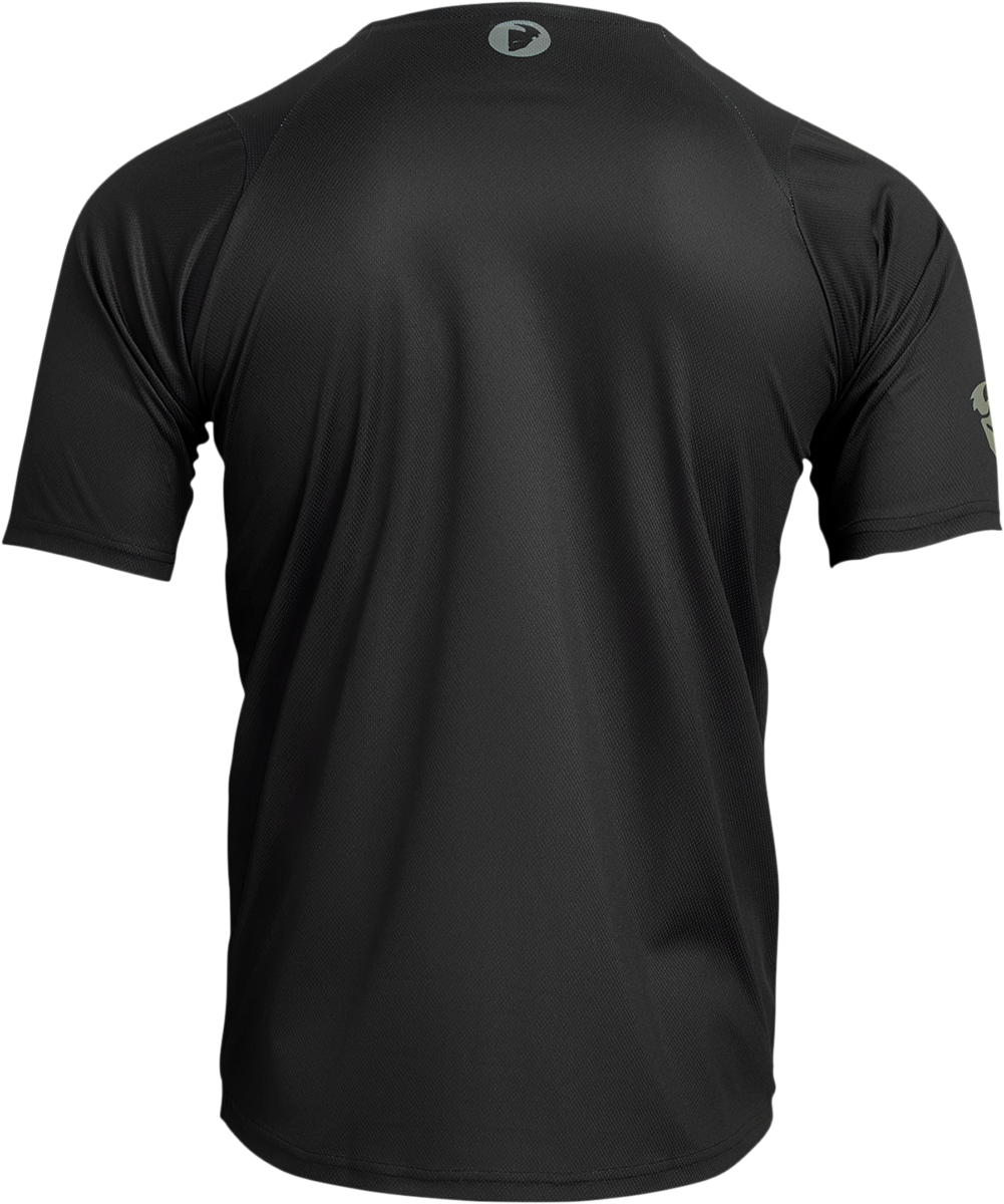 Black THOR Assist Caliber short-sleeve jersey in XL with breathable fabric and logo details, designed for motocross riding.