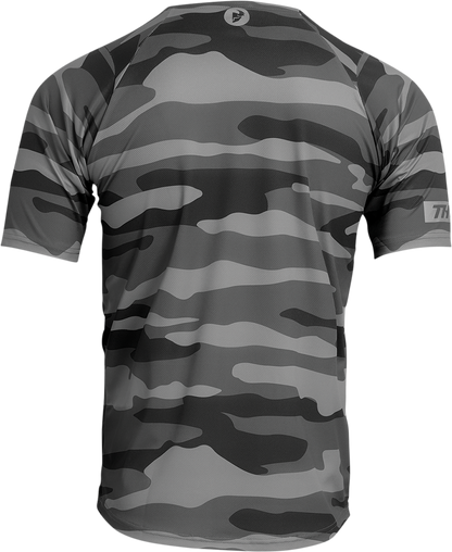 Dark gray THOR Assist short-sleeve MTB jersey with camouflage pattern, featuring breathable fabric and athletic fit for mountain biking.