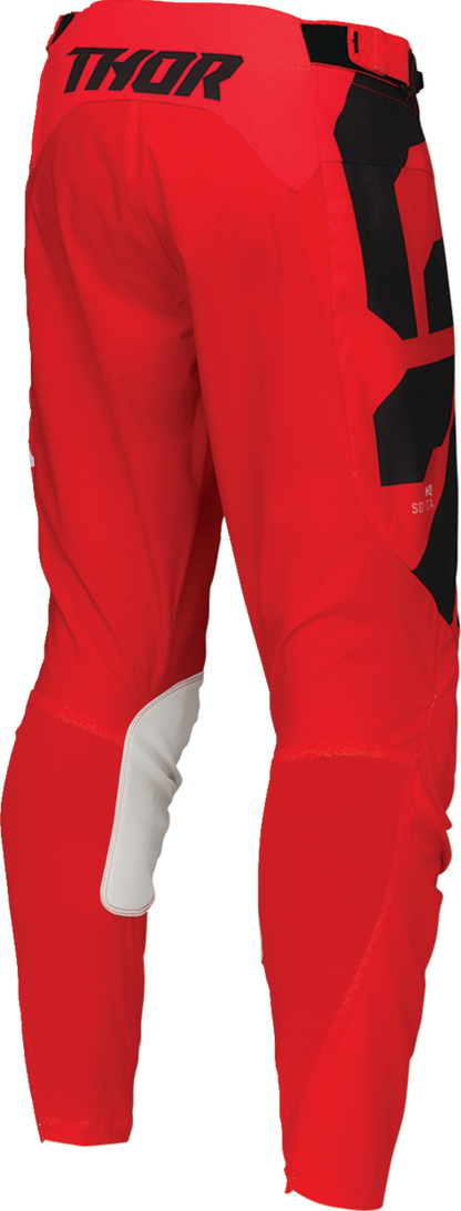 Red THOR Launchmode Forge motocross pants in US 30 with reinforced durability and enhanced ventilation for riding comfort.