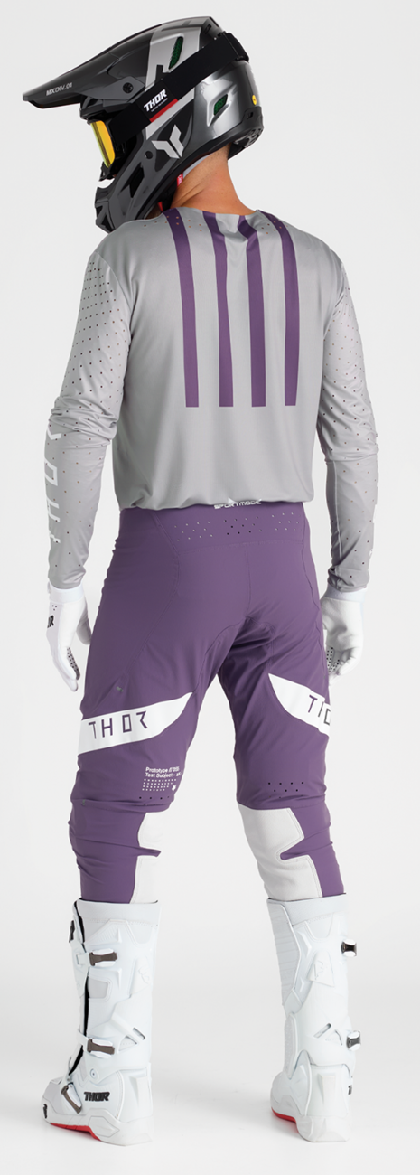 White THOR Launchmode gloves in large size, showing the durable motorcycle glove with reinforced knuckles and adjustable wrist strap.