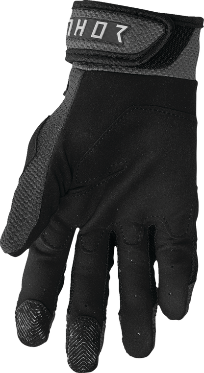 Black and charcoal THOR Terrain gloves in 2XL size, featuring durable riding gloves with textured grip and adjustable wrist closure.