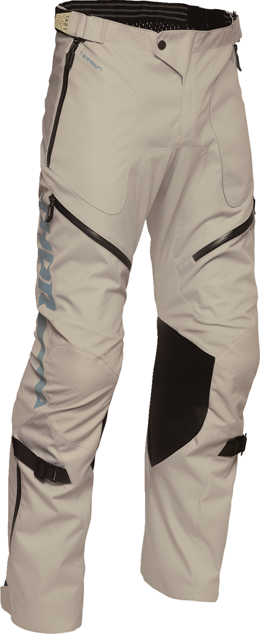 THOR Terrain over-the-boot riding pants in sand color for US 34 size, featuring durable motorcycle gear design.
