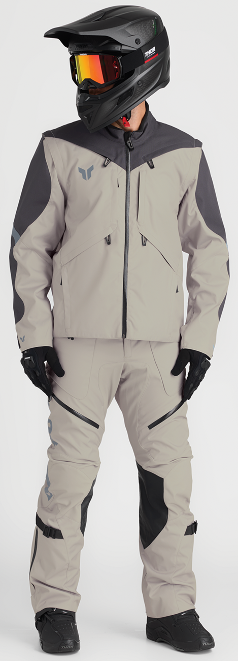 THOR Terrain over-the-boot pants in sand color, US size 36, featuring durable fabric and rugged design for off-road riding.