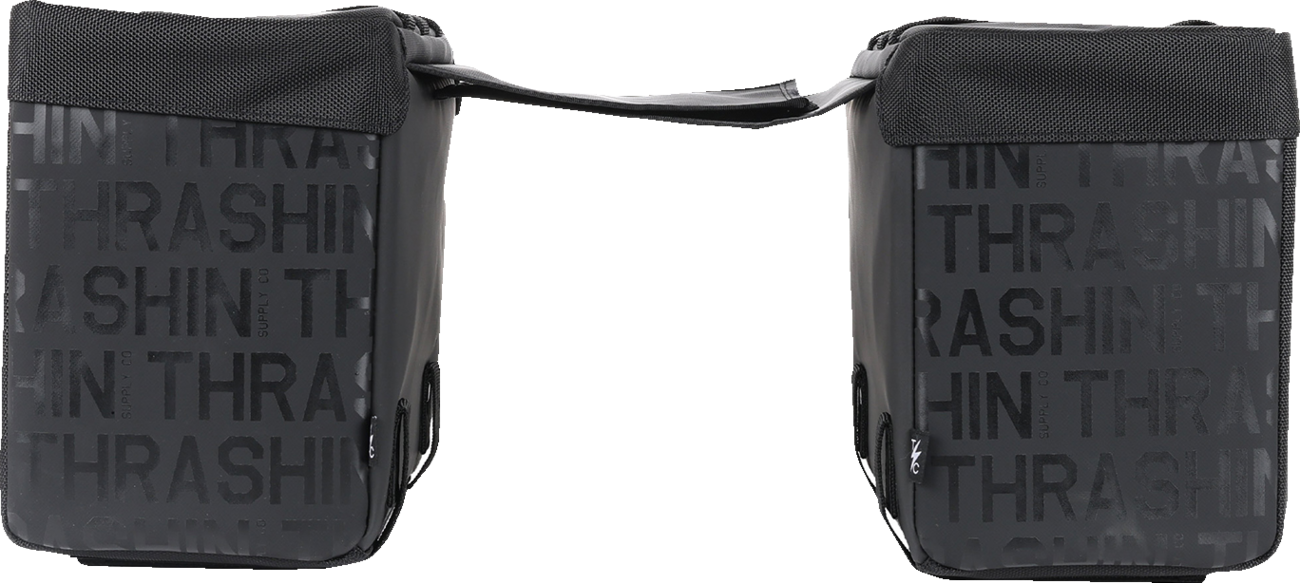 THRASHIN SUPPLY CO. Essential Saddlebags, 10-liter motorcycle saddlebags in black with buckles and straps for secure storage.