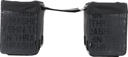THRASHIN SUPPLY CO. Essential Saddlebags, 10-liter motorcycle saddlebags in black with buckles and straps for secure storage.
