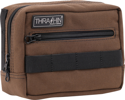 Brown THRASHIN SUPPLY CO. handlebar bag with MOLLE webbing and multiple attachment points for cycling accessories.