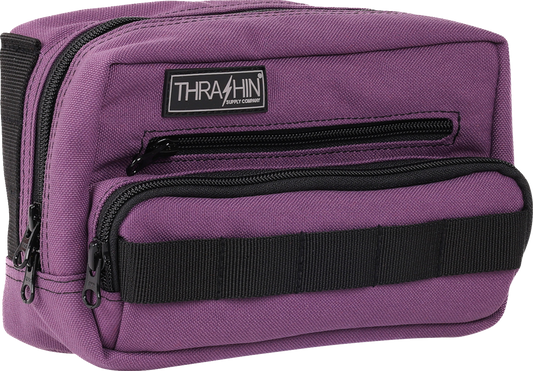 Purple THRASHIN SUPPLY CO. Handlebar Bag Plus mounted on a bicycle handlebar for convenient storage and easy access.