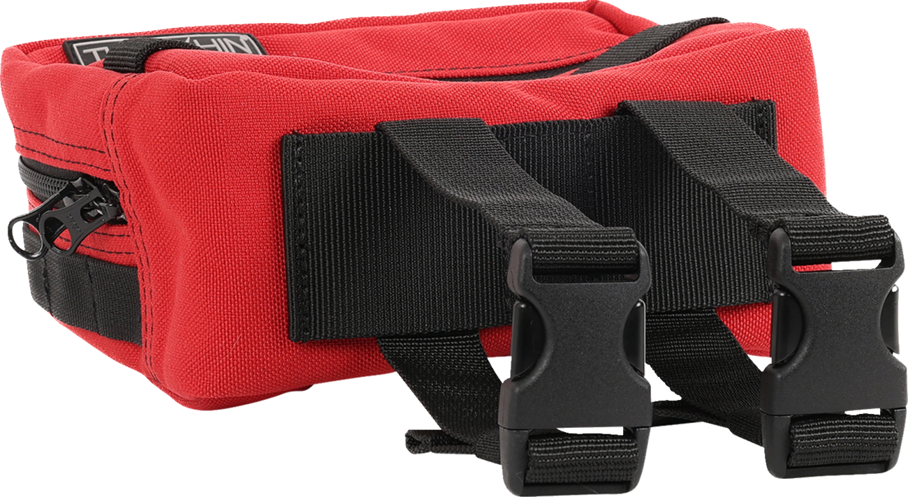 Red Thrasin Supply Co. handlebar bag mounted on a bicycle for easy storage and quick access during rides.