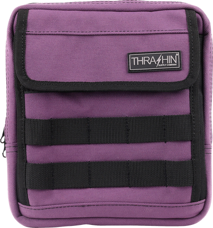 Purple Thrashin Supply Co. Handlebar Bag Slim for bikes, compact design with adjustable straps, ideal for cycling storage.