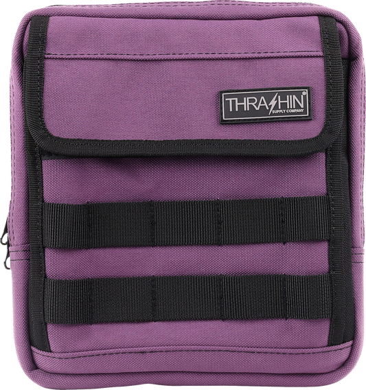 Purple Thrashin Supply Co. Handlebar Bag Slim for bikes, compact design with adjustable straps, ideal for cycling storage.