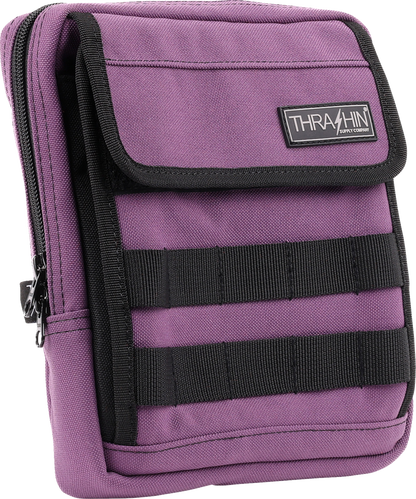 Purple THRASHIN SUPPLY CO. Handlebar Bag Slim mounted on a bicycle handlebar, compact and sleek for cycling gear storage