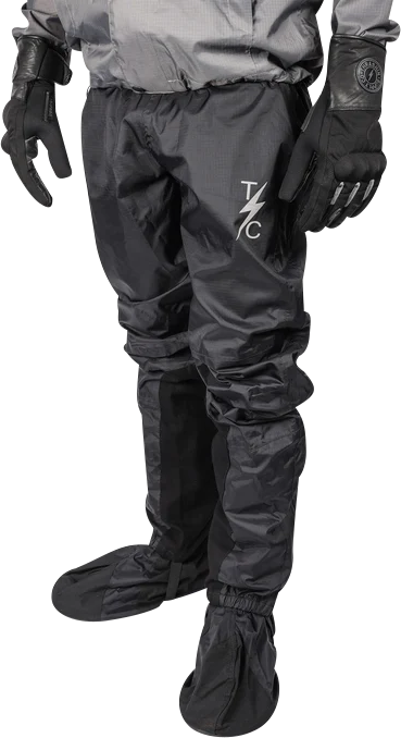 Black THRASHIN SUPPLY CO. Mission Rain Pants in size S/M, shown with adjustable waistband and waterproof material.