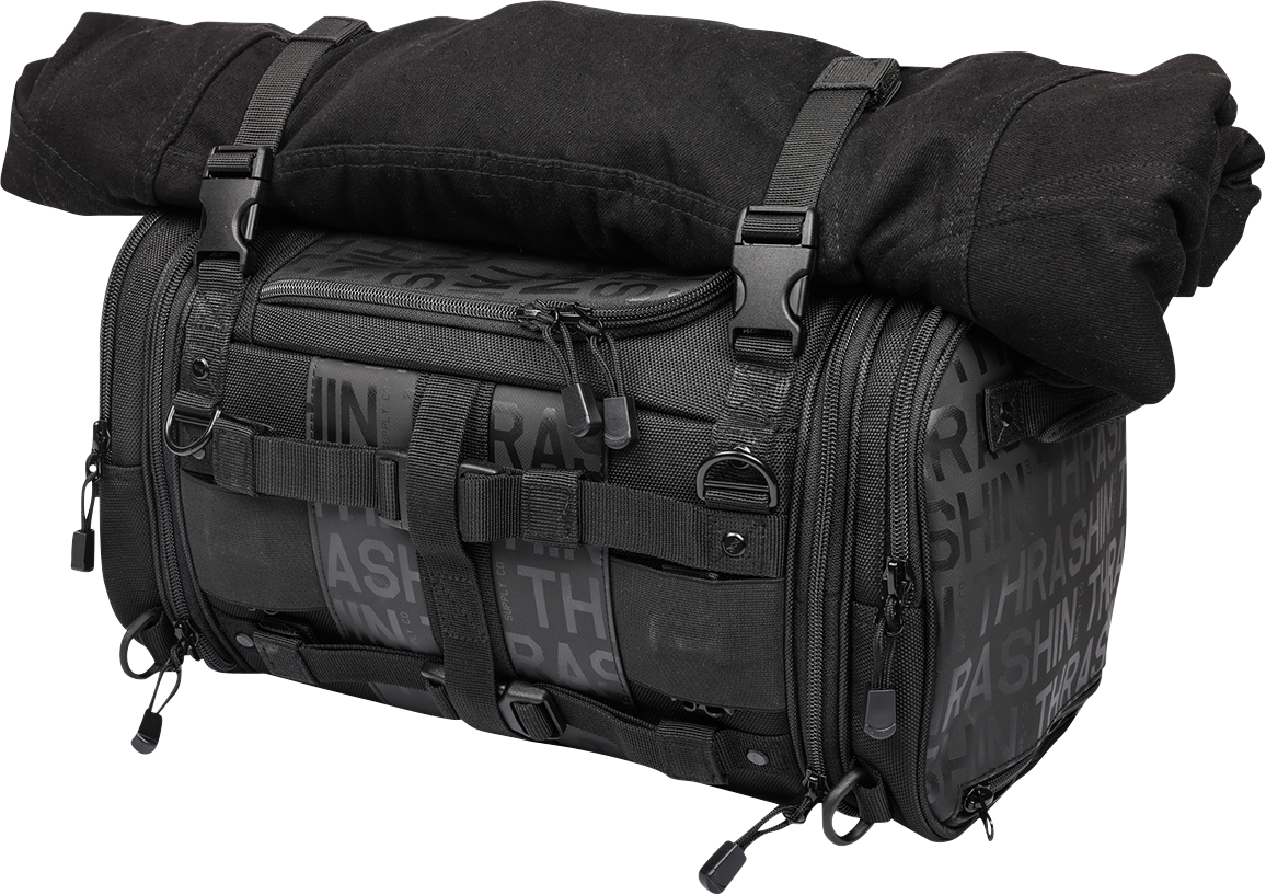 THRASHIN SUPPLY CO. motorcycle passenger bag with 32L capacity, versatile mounting options, black durable material, and reflective accents.