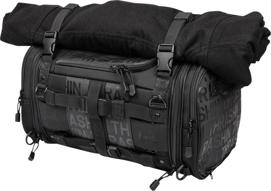 THRASHIN SUPPLY CO. motorcycle passenger bag with 32L capacity, versatile mounting options, black durable material, and reflective accents.