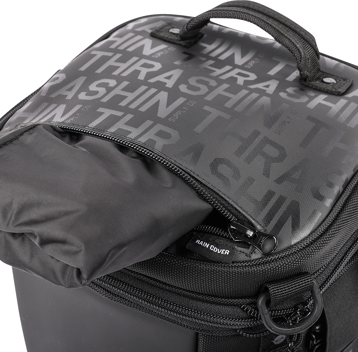 THRASHIN SUPPLY CO. motorcycle passenger bag TSB-0009 with 32L capacity and versatile mounting options, shown mounted on a motorcycle.