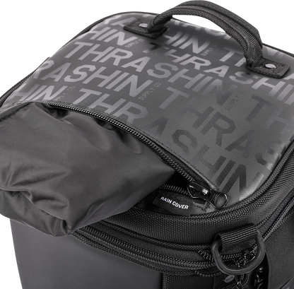 THRASHIN SUPPLY CO. motorcycle passenger bag TSB-0009 with 32L capacity and versatile mounting options, shown mounted on a motorcycle.