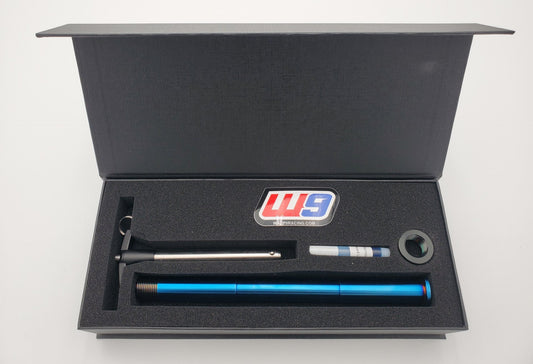 Warp9Racing Surron Ultra Bee Titanium Rear Axle, compact thumbnail image showing high-strength motorcycle part.
